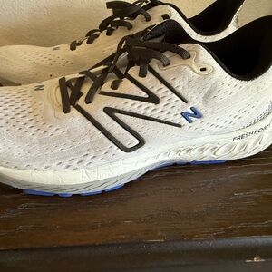 Original Use White and Black Athletic Shoes